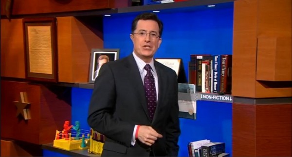 Mar 2 2011_wedontdotheseanymore Stephen Colbert standing at his bookshelves