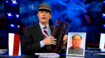 Stephen Colbert doing taxes in a Communist hat Stephen Colbert doing taxes in a Communist hat