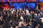 Stephen Colbert poses with the troops on the set of the Colbert Report Stephen Colbert poses with the troops on the set of the Colbert Report